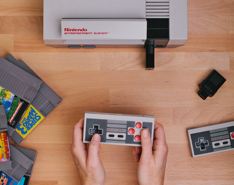 Illustration for article titled Wireless Adapter Lets You Use a PS4 Controller on Your Classic 8-Bit NES Console